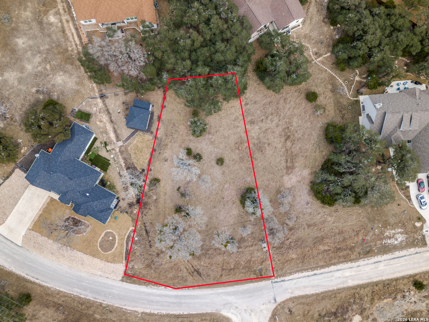 an aerial view of a house a yard