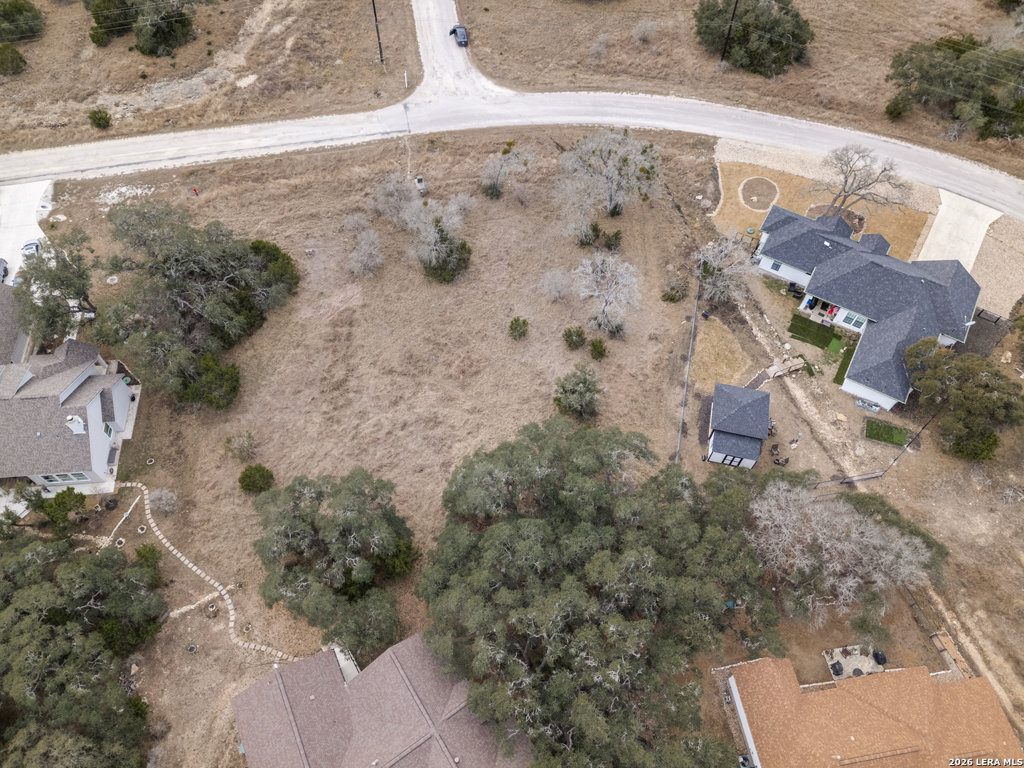 223 George Dolson Blanco, TX 78606 - Photo 16 of 16 an aerial view of a house with a yard
