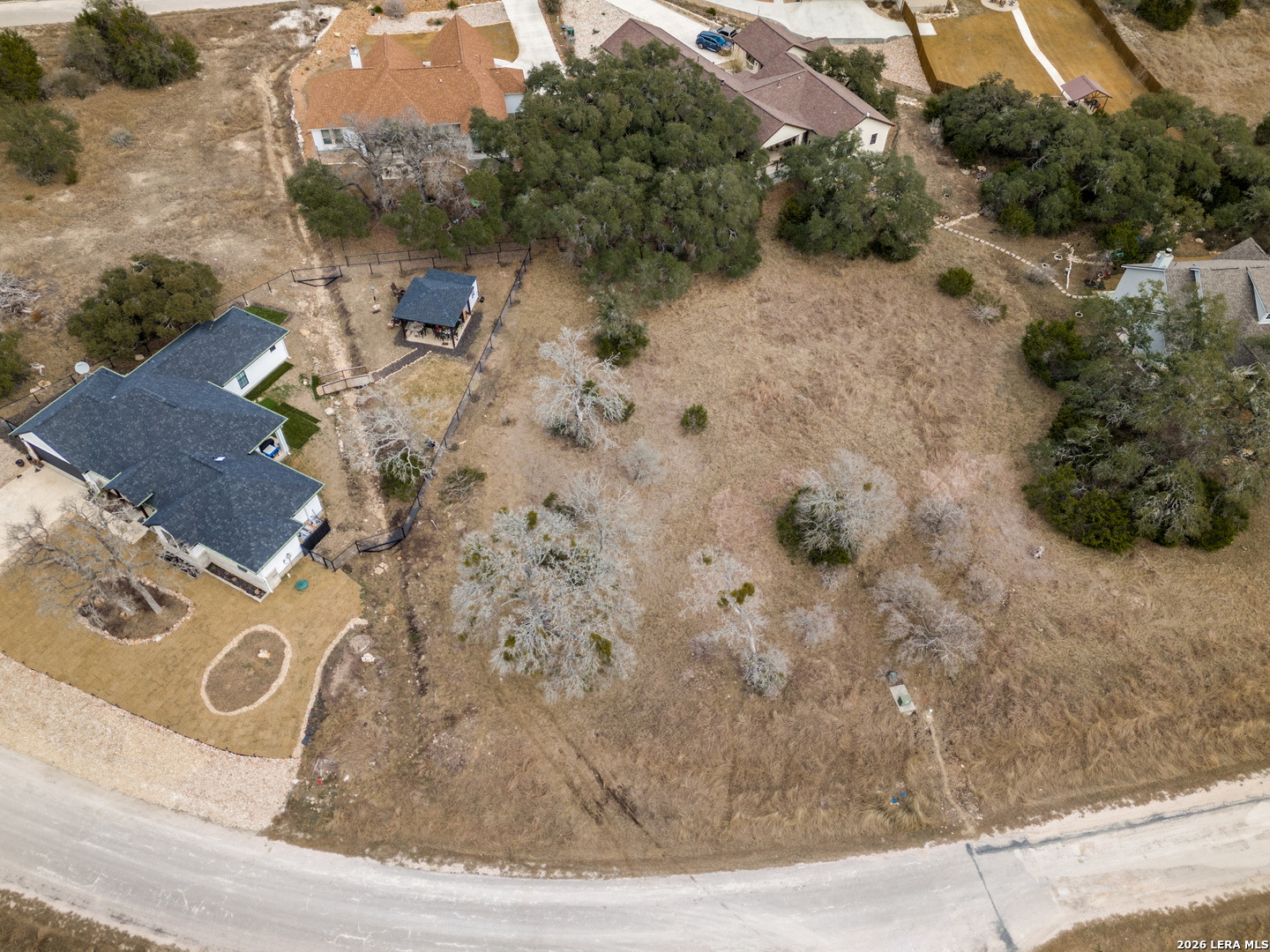 223 George Dolson Blanco, TX 78606 - Photo 2 of 16 an aerial view of a house with a yard