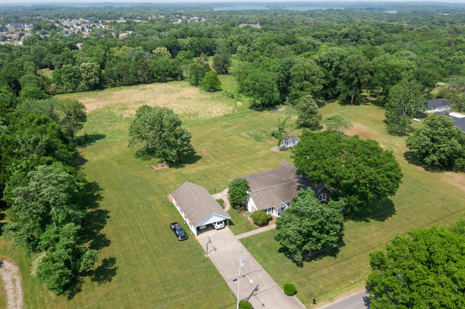4100 Maxwell Road Antioch, TN 37013 - Photo 3 of 24 a view of a lake with a yard