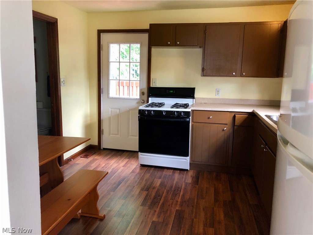 409 Mill Road Ravenna, OH 44266 - Photo 3 of 14 Kitchen is newly painted with new laminate flooring