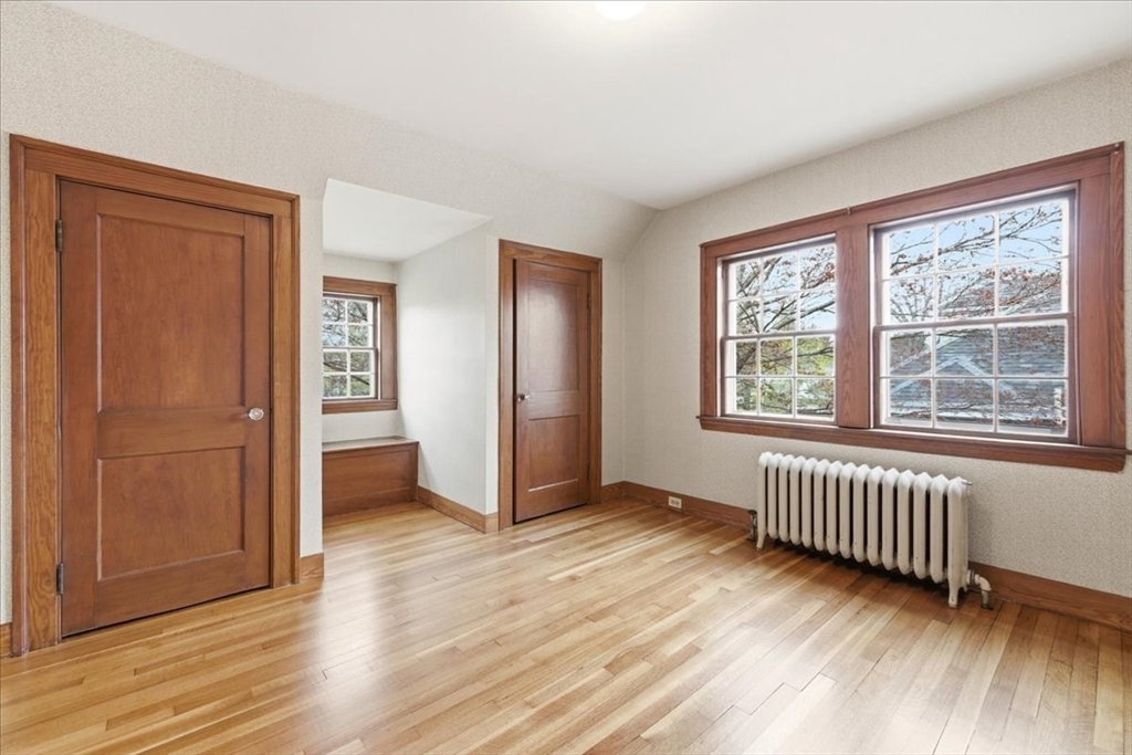 238 Harris Avenue Needham, MA 02492 - Photo 22 of 35 an empty room with wooden floor and windows
