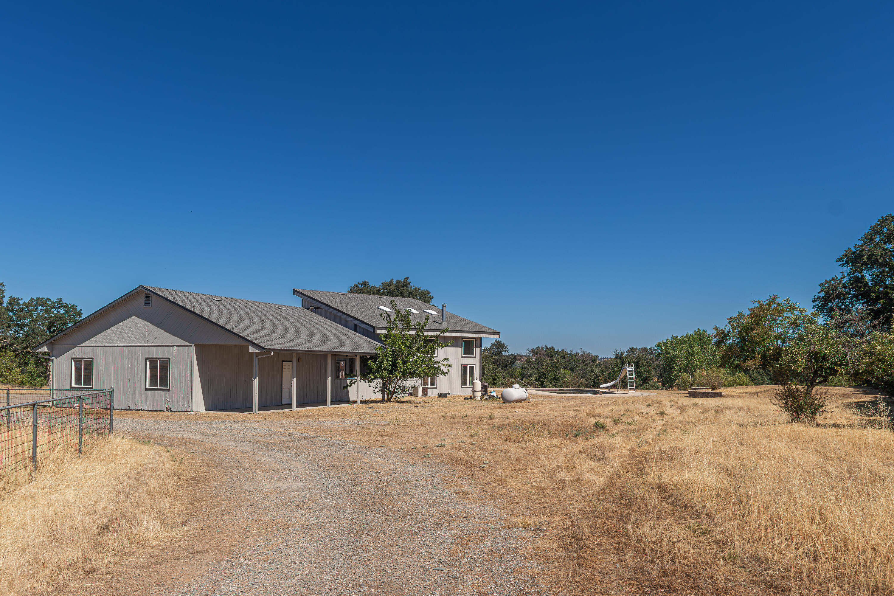 17945 Rivers Edge Drive Red Bluff, CA 96080 - Photo 12 of 25 a view of house with a outdoor space