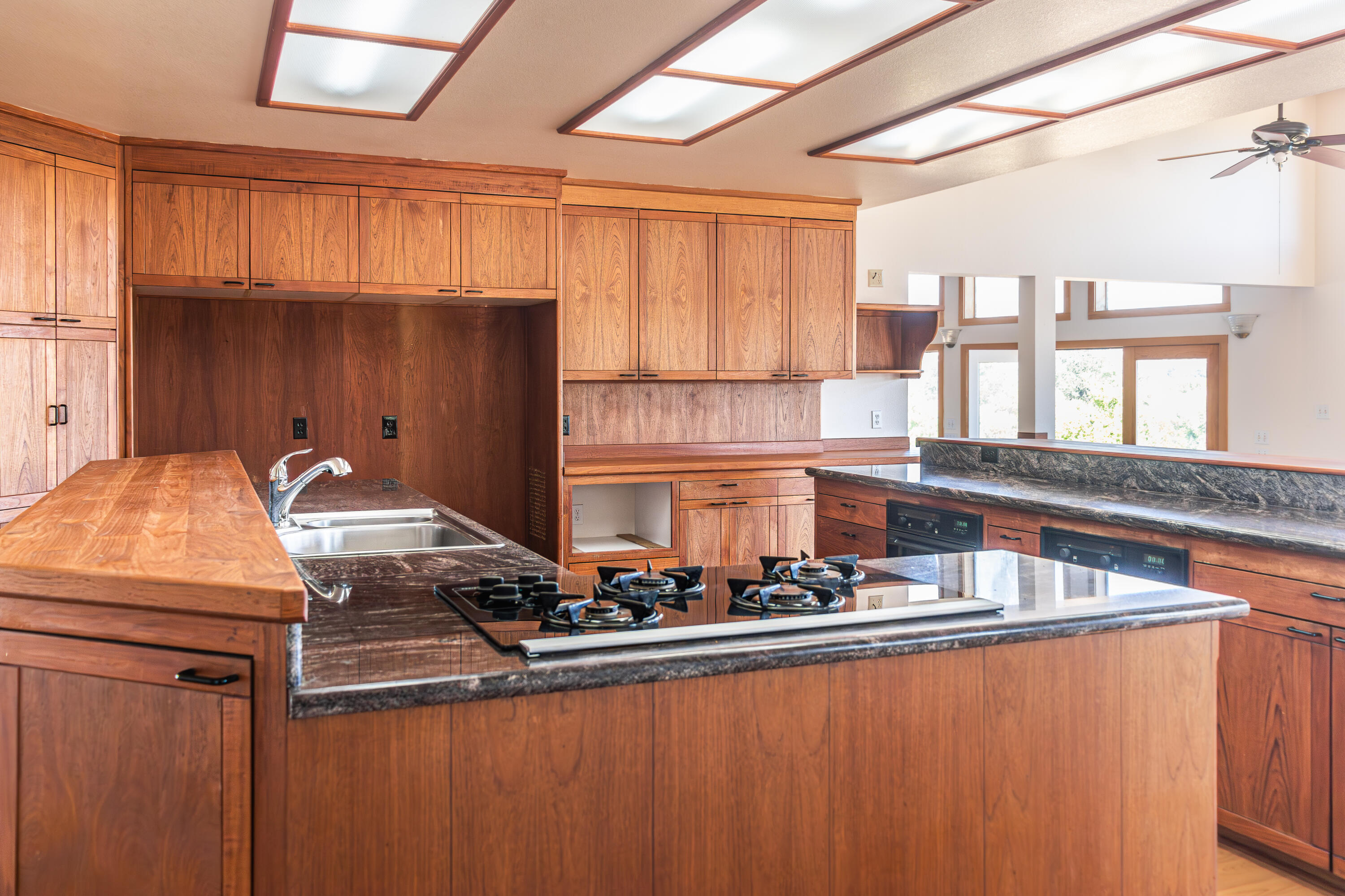 17945 Rivers Edge Drive Red Bluff, CA 96080 - Photo 14 of 25 a kitchen with stainless steel appliances granite countertop a sink and a stove