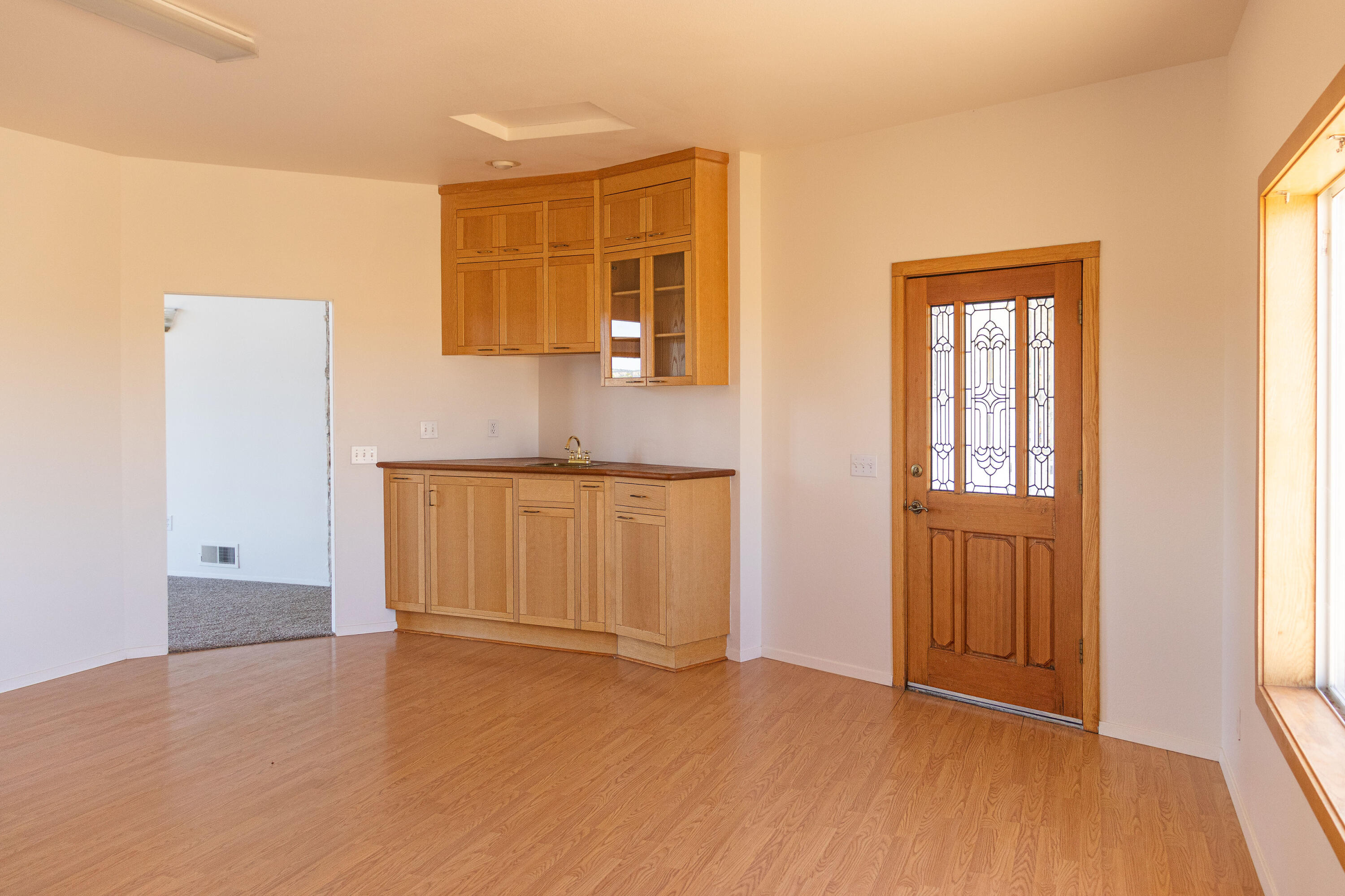 17945 Rivers Edge Drive Red Bluff, CA 96080 - Photo 20 of 25 an empty room with windows and wardrobe
