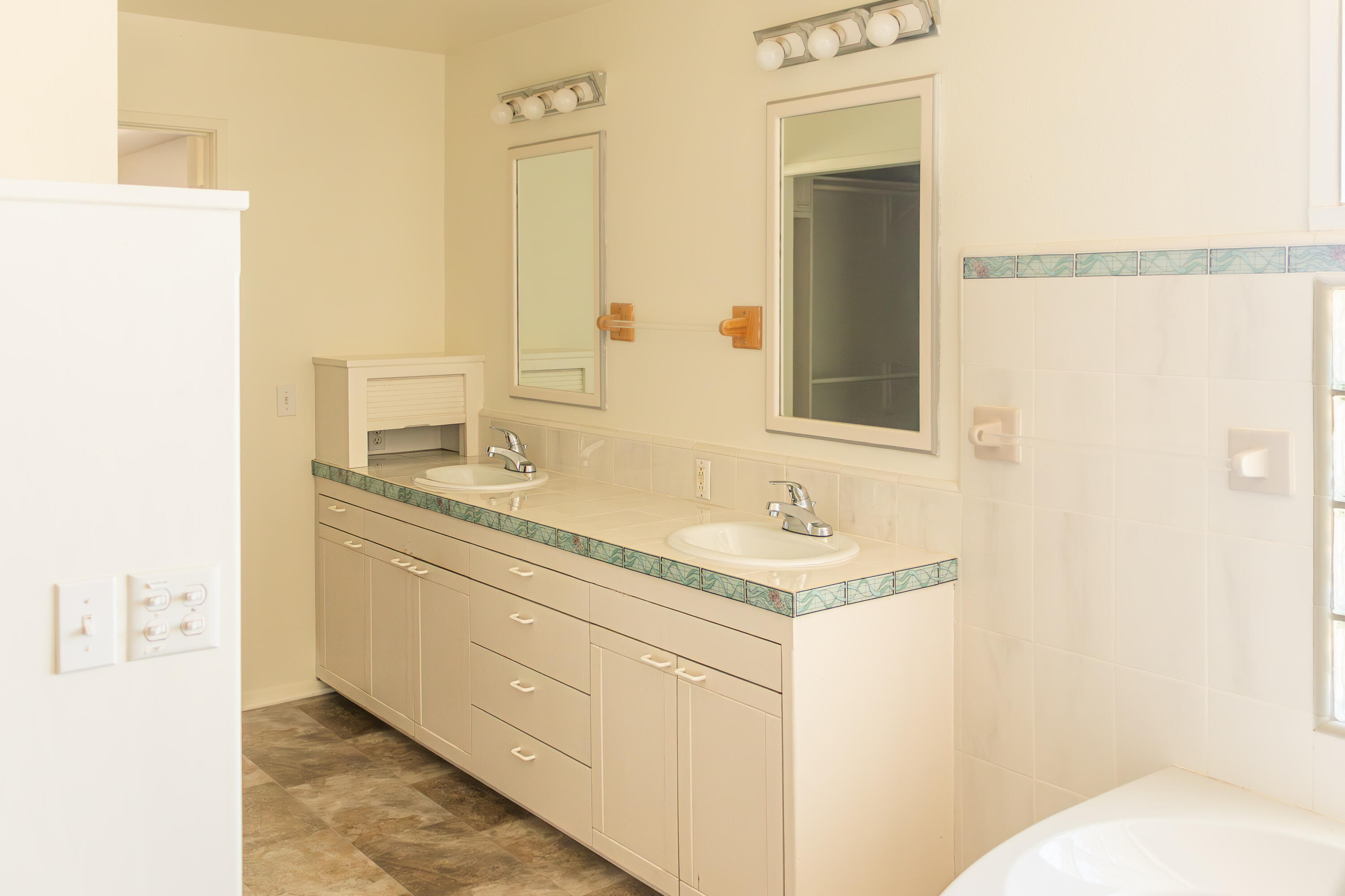 17945 Rivers Edge Drive Red Bluff, CA 96080 - Photo 22 of 25 a bathroom with a sink and a mirror