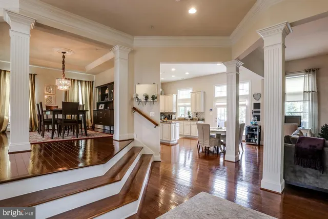 a view of a living room and dining room