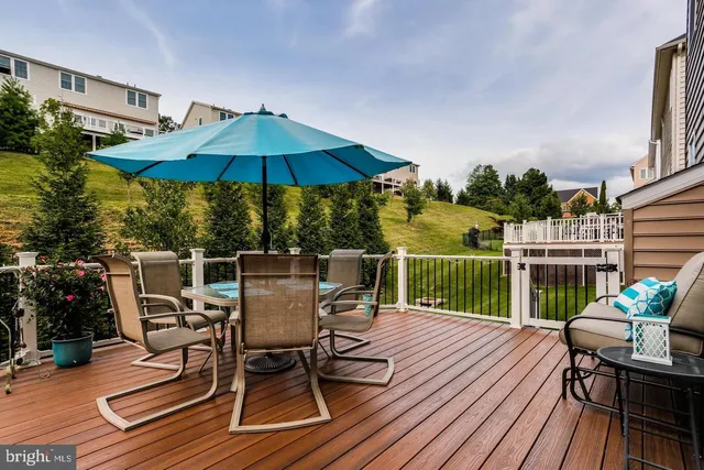 a view of a chairs and table on the wooden floor