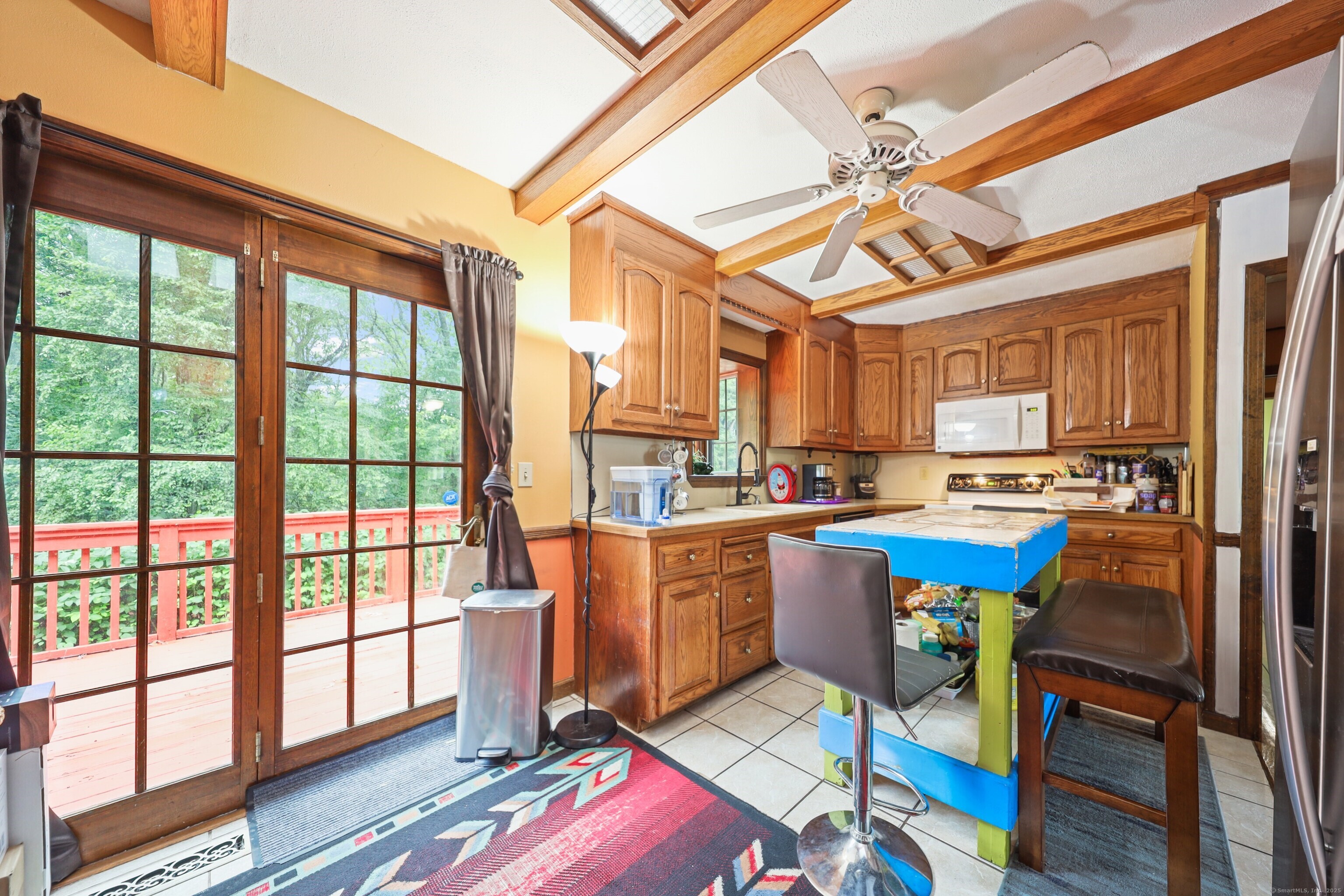 3 Rozum Circle Prospect, CT 06712 - Photo 11 of 40 a open kitchen with stainless steel appliances granite countertop a stove a sink and a dining table