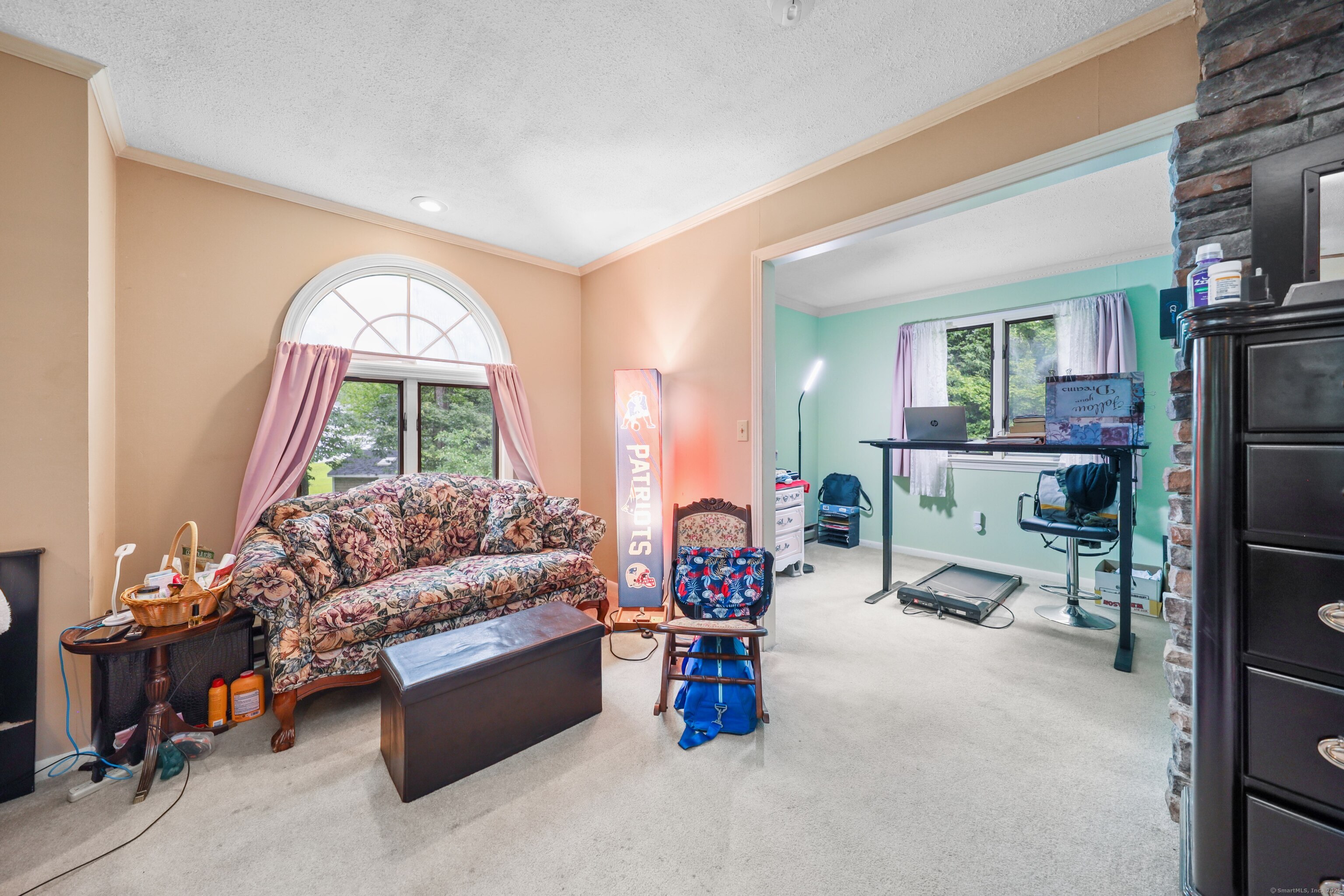 3 Rozum Circle Prospect, CT 06712 - Photo 18 of 40 a living room with furniture and a large window