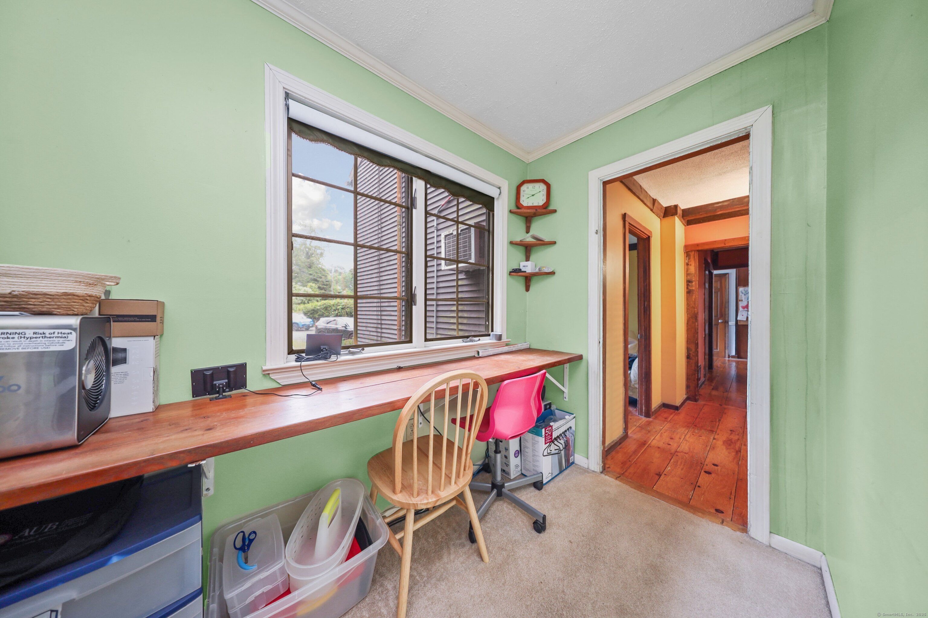 3 Rozum Circle Prospect, CT 06712 - Photo 19 of 40 a dining room with furniture and a window