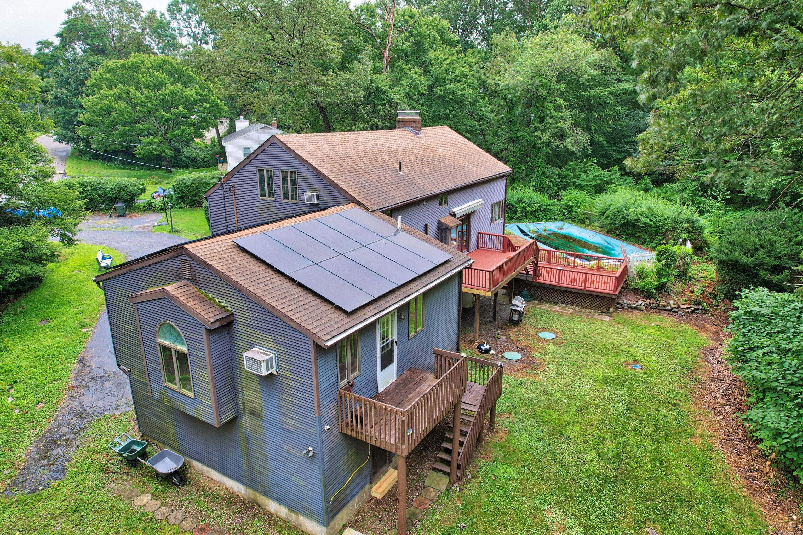 3 Rozum Circle Prospect, CT 06712 - Photo 28 of 40 an aerial view of a house with swimming pool garden view and trees