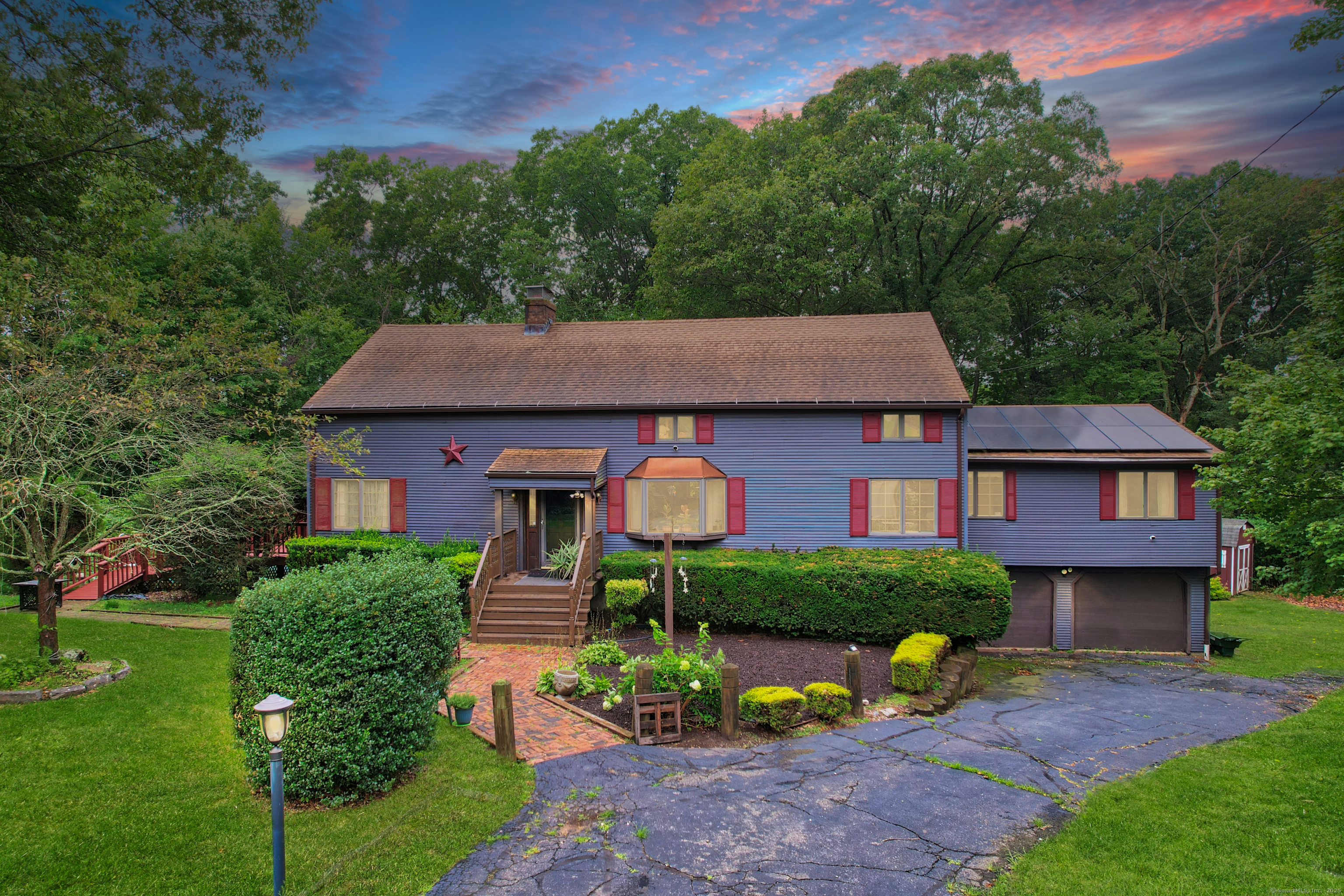 3 Rozum Circle Prospect, CT 06712 - Photo 3 of 40 front view of a house with a yard