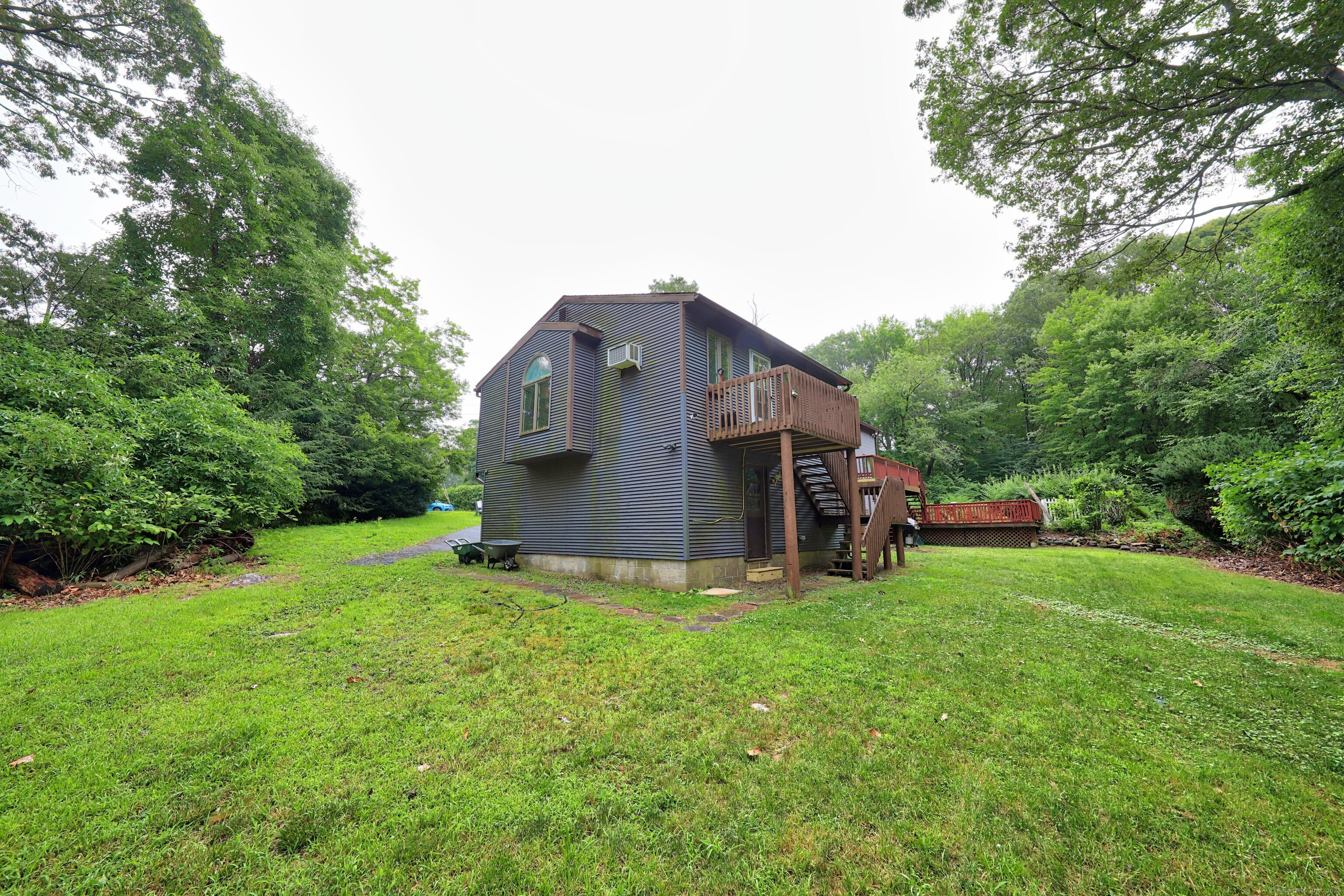 3 Rozum Circle Prospect, CT 06712 - Photo 32 of 40 a view of a house with backyard porch and garden