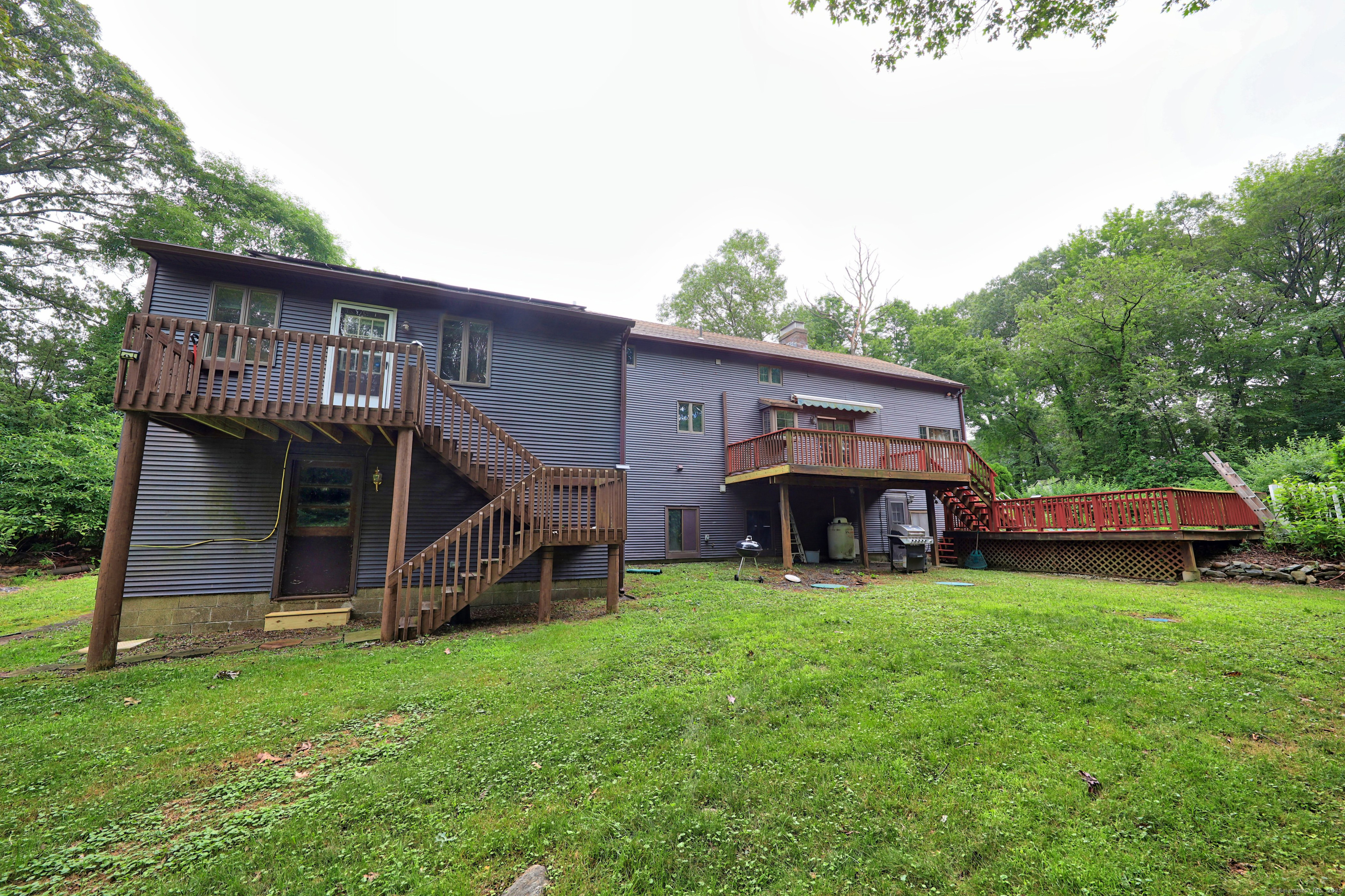 3 Rozum Circle Prospect, CT 06712 - Photo 33 of 40 a view of a house with a yard and sitting area