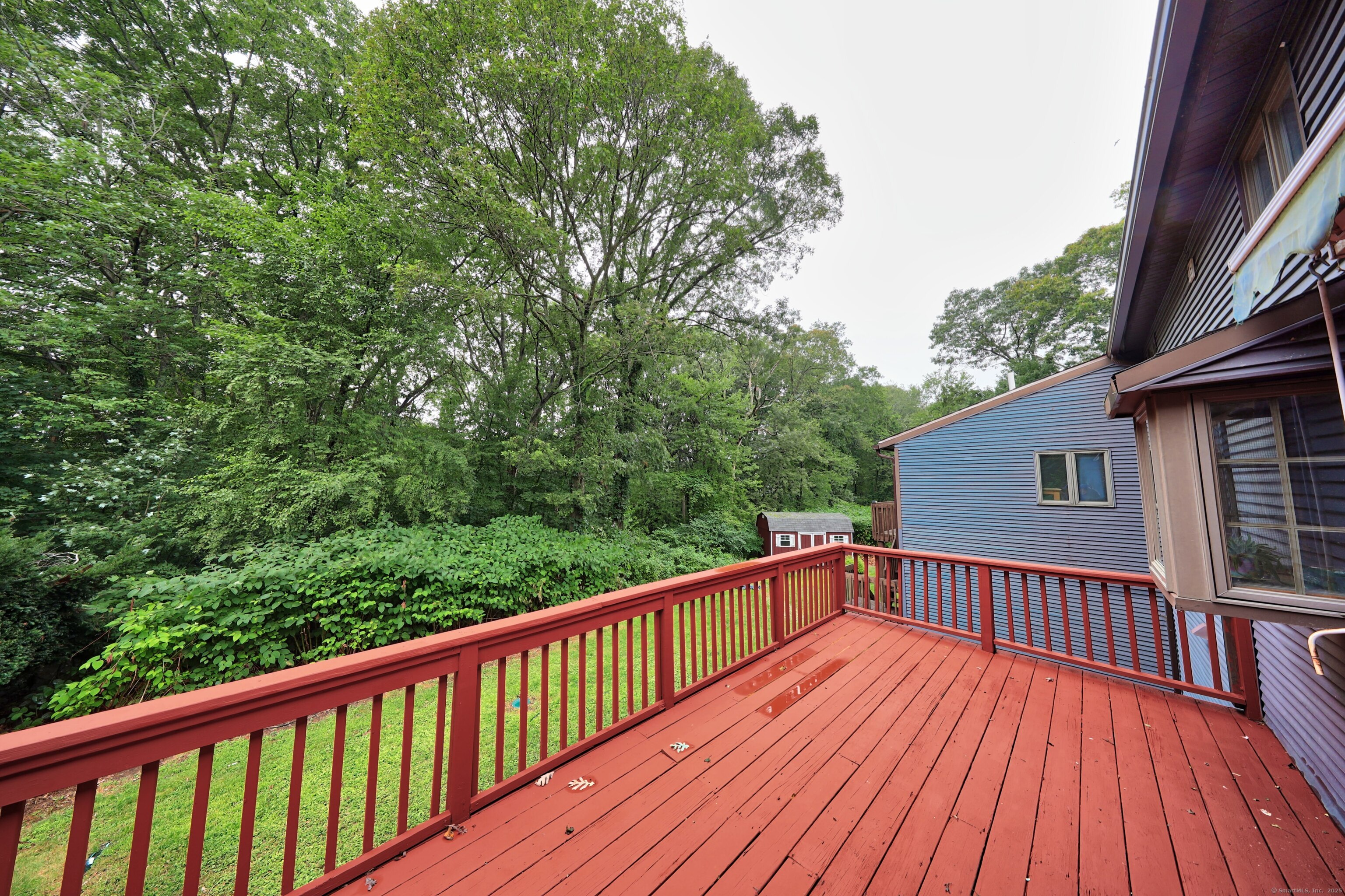 3 Rozum Circle Prospect, CT 06712 - Photo 35 of 40 a view of balcony with wooden floor and fence