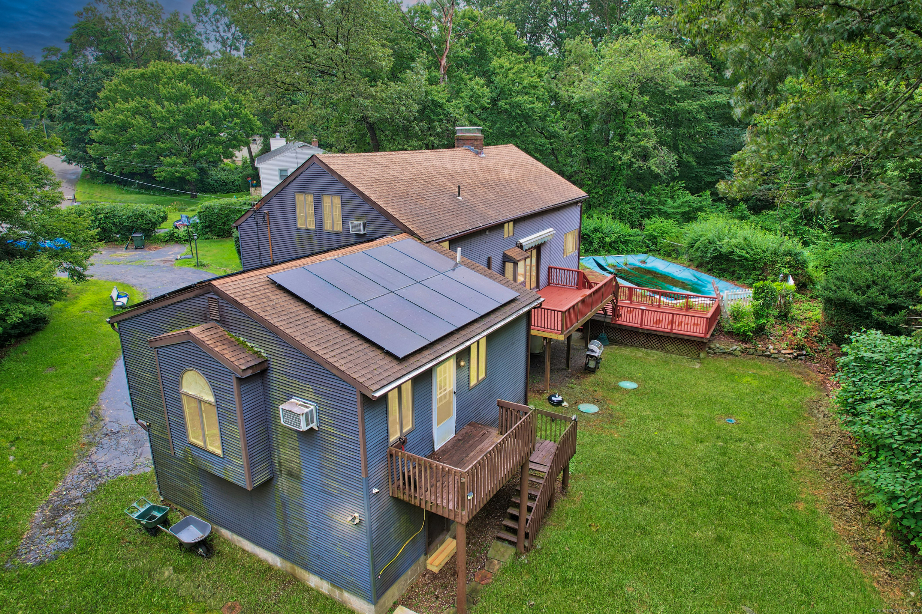 3 Rozum Circle Prospect, CT 06712 - Photo 4 of 40 an aerial view of a house with swimming pool garden and patio
