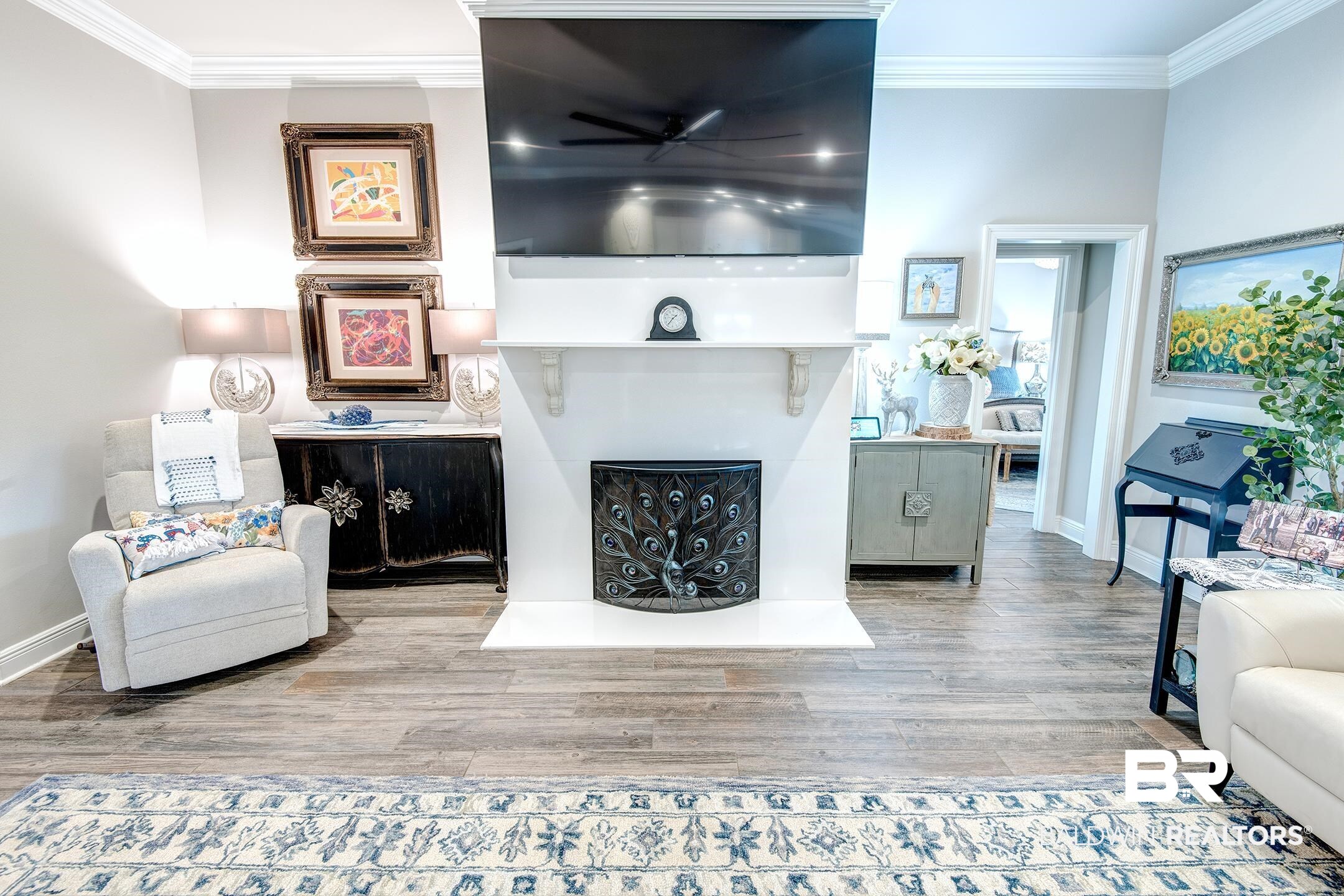 9988 Dunleith Loop Daphne, AL 36526 - Photo 28 of 51 Living room featuring light hardwood / wood-style flooring and crown molding