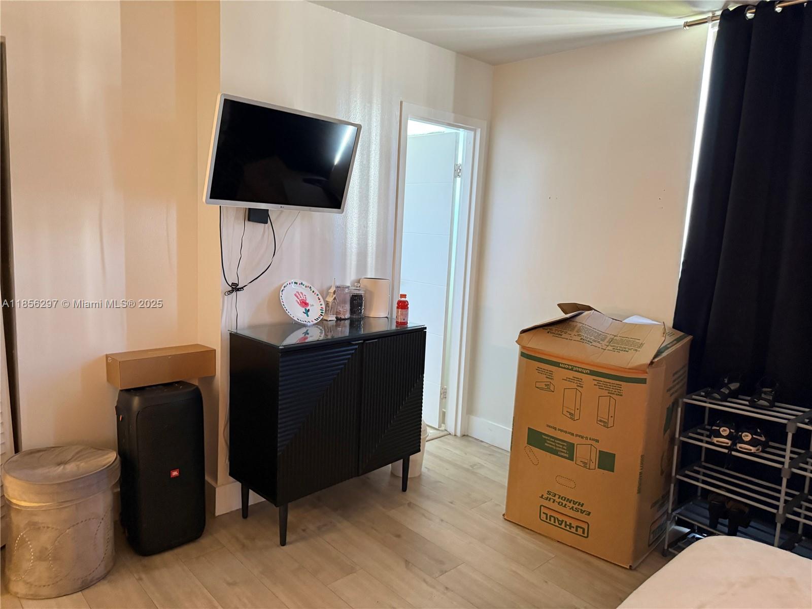 16919 North Bay Road, Unit 710 Sunny Isles Beach, FL 33160 - Photo 6 of 7 a room with storage and utility