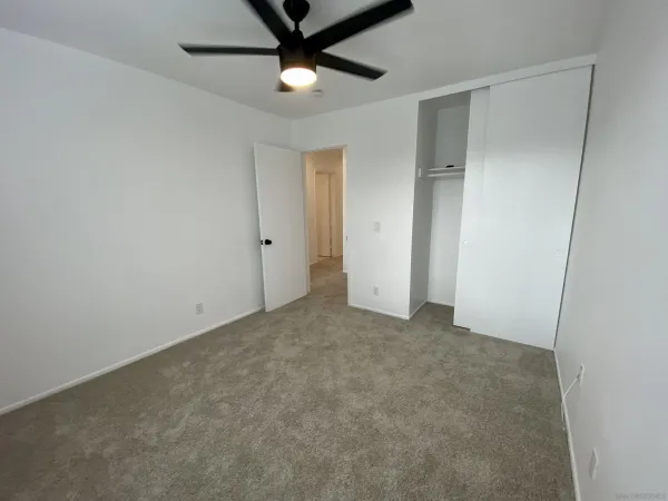 a bathroom with a tub and a shower