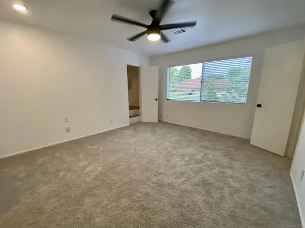 a view of hallway with closet