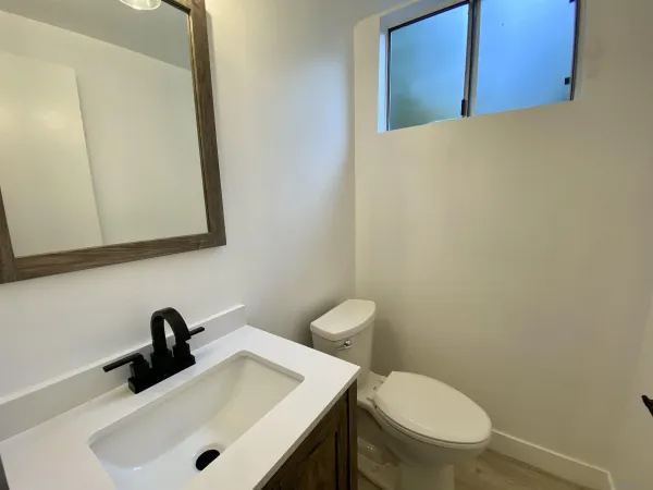 a bathroom with a sink and a toilet
