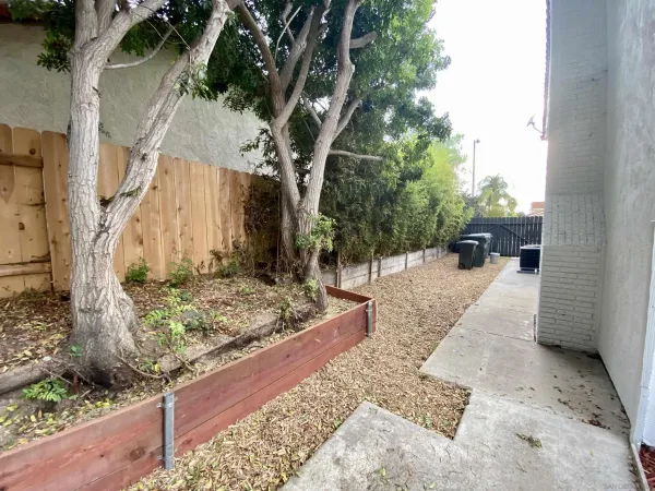 a backyard of a house with lots of green space
