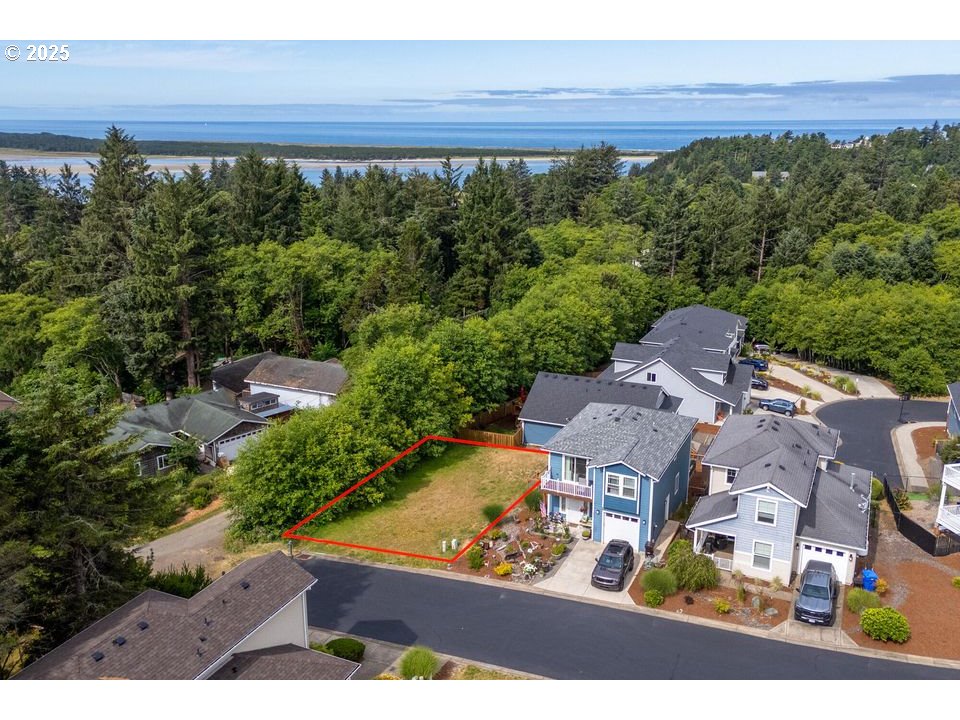 Moondancer Lane, Unit 62 Tillamook, OR 97141 - Photo 9 of 10 an aerial view of a house with a yard