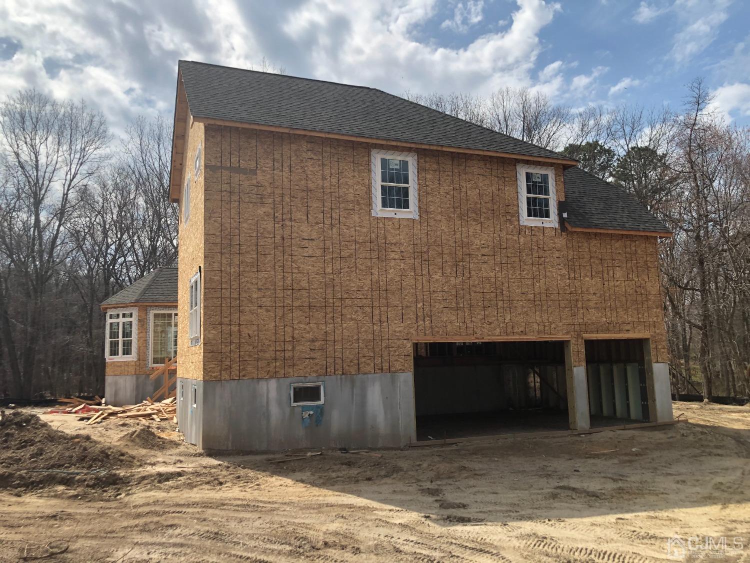 B Dutch Road East Brunswick, NJ 08816 - Photo 4 of 6 a front view of a house with yard