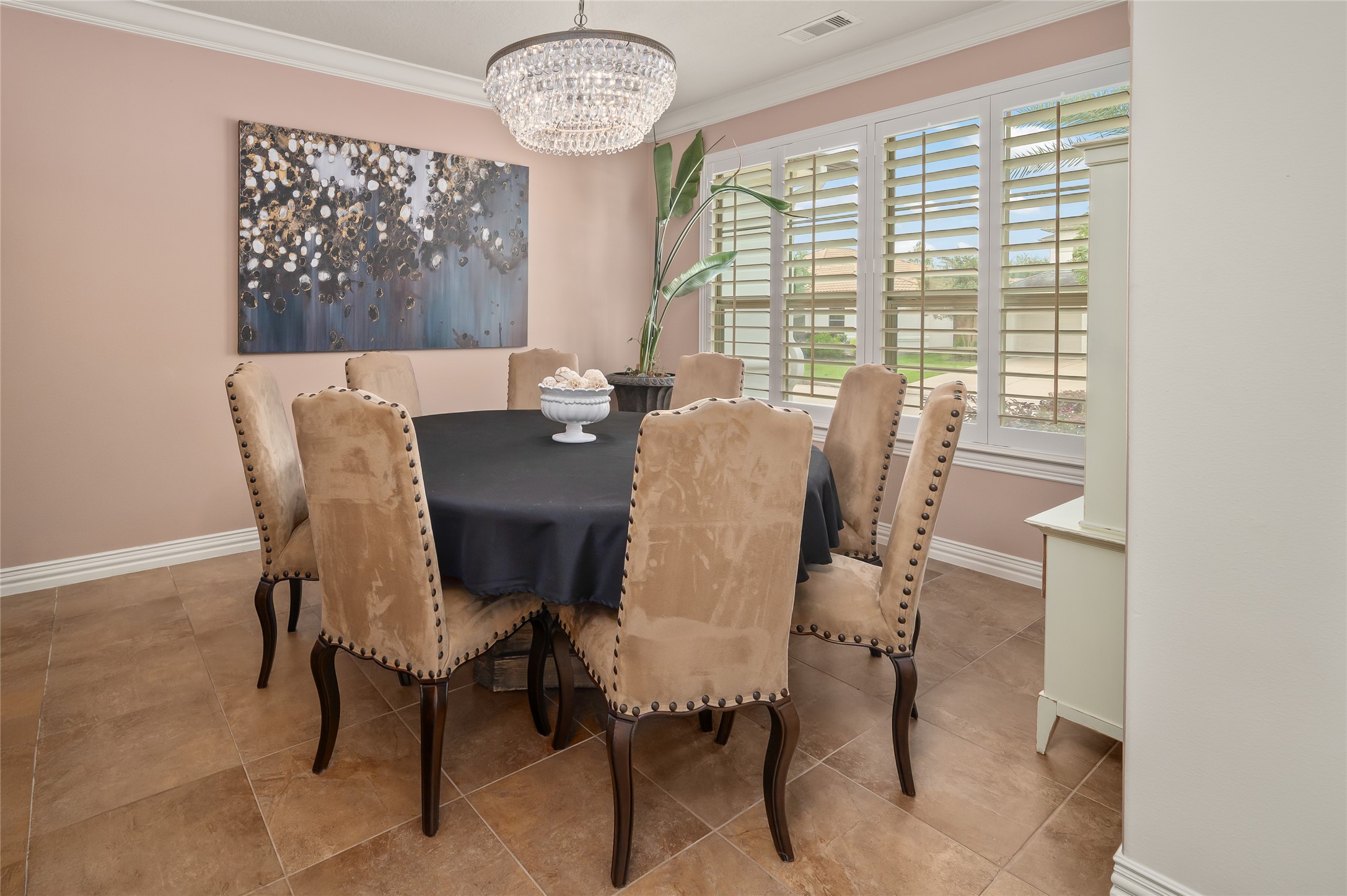 2127 Thicket Ridge Lane Houston, TX 77077 - Photo 7 of 48 The dining room located right off the entry foyer features a custom chandelier and plantation shutters with an outstanding view of the beautiful front yard. There is also a recessed area for your free standing storage furniture.
