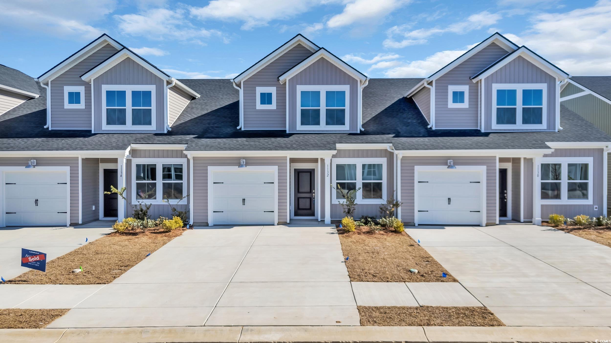 1132 Blueback Herring Way Conway, SC 29526 - Photo 1 of 31 Craftsman house with a garage, driveway, and roof