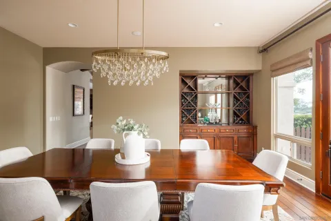 a living room with furniture window and wooden floor