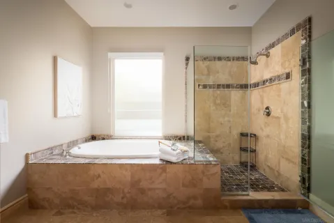 a bedroom with a bed and a table