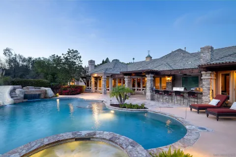 a view of a patio with couches table and chairs
