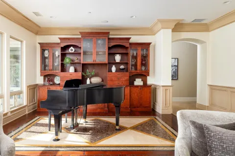 a work room with furniture and wooden floor