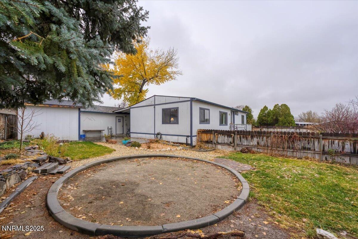 485 Capricorn Circle Reno, NV 89521 - Photo 29 of 31 a view of a house with swimming pool and sitting area