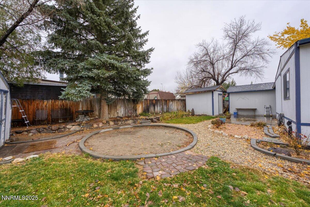 485 Capricorn Circle Reno, NV 89521 - Photo 30 of 31 a view of a house with backyard and sitting area
