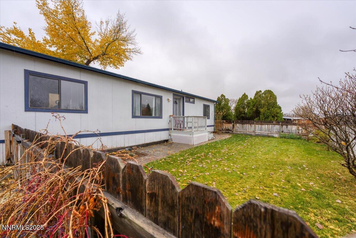 485 Capricorn Circle Reno, NV 89521 - Photo 31 of 31 a swimming pool with outdoor seating and yard