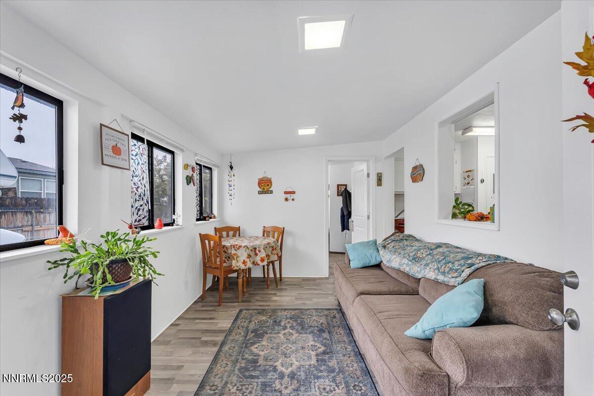 485 Capricorn Circle Reno, NV 89521 - Photo 7 of 31 a living room with furniture and flowers