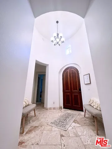 a view of a hallway with entryway