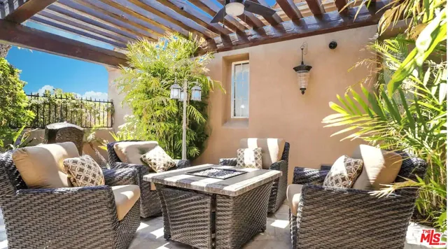 a view of an outdoor space with lounge chair