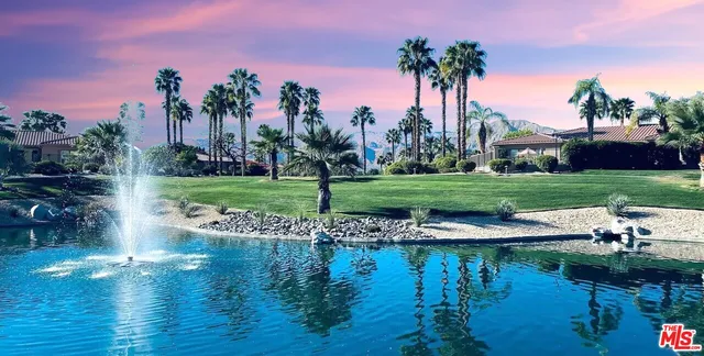 a view of a lake with a big yard
