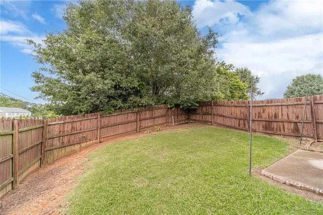 a view of backyard and tree