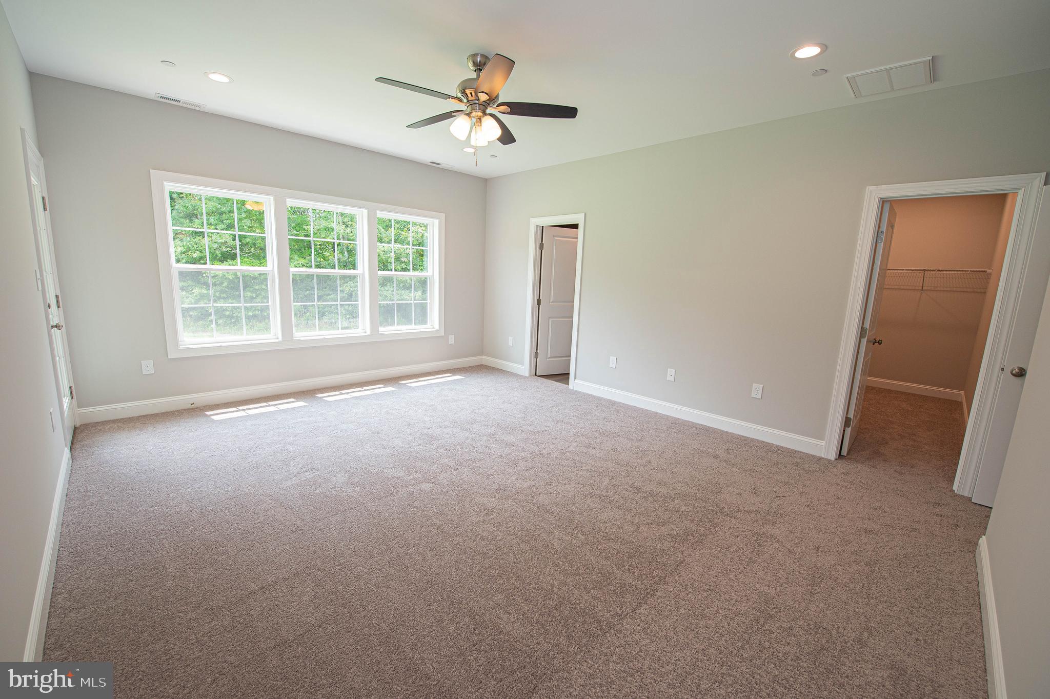 22372 Concord Pond Road Georgetown, DE 19947 - Photo 20 of 43 a view of a livingroom with a ceiling fan and window
