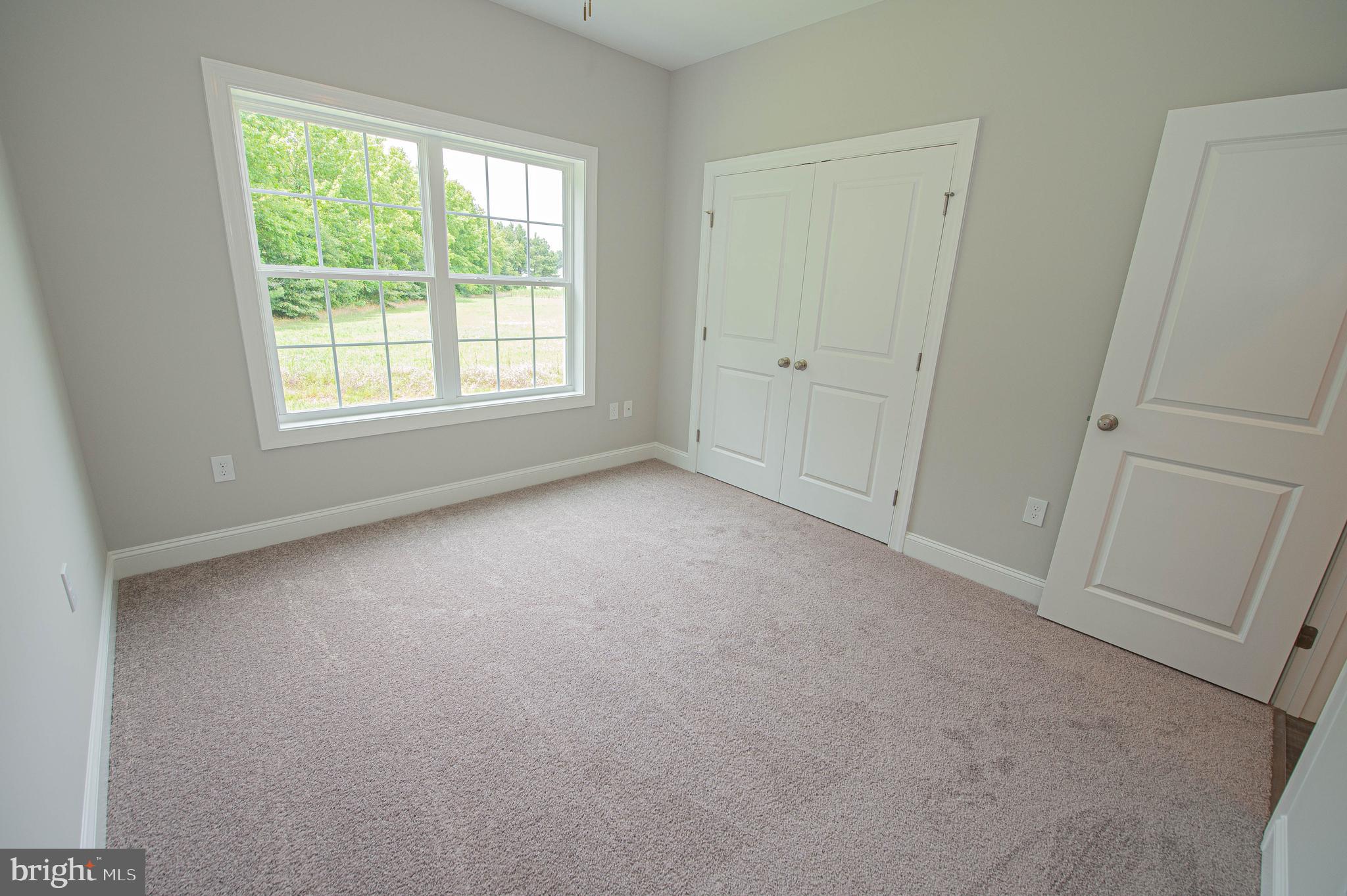 22372 Concord Pond Road Georgetown, DE 19947 - Photo 31 of 43 an empty room with a window