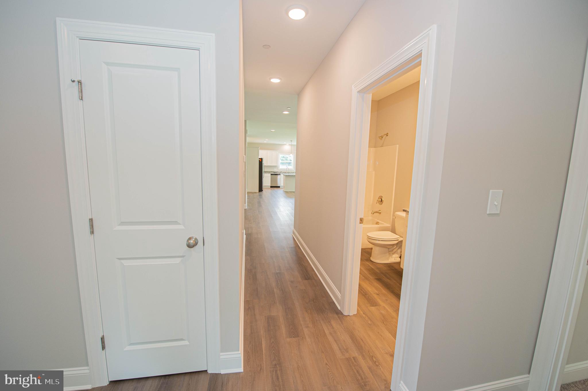 22372 Concord Pond Road Georgetown, DE 19947 - Photo 36 of 43 a view of hallway with wooden floor