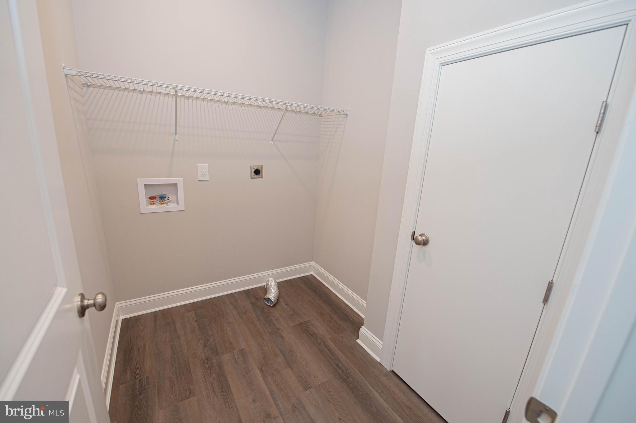 22372 Concord Pond Road Georgetown, DE 19947 - Photo 40 of 43 a view of a room with wooden floor