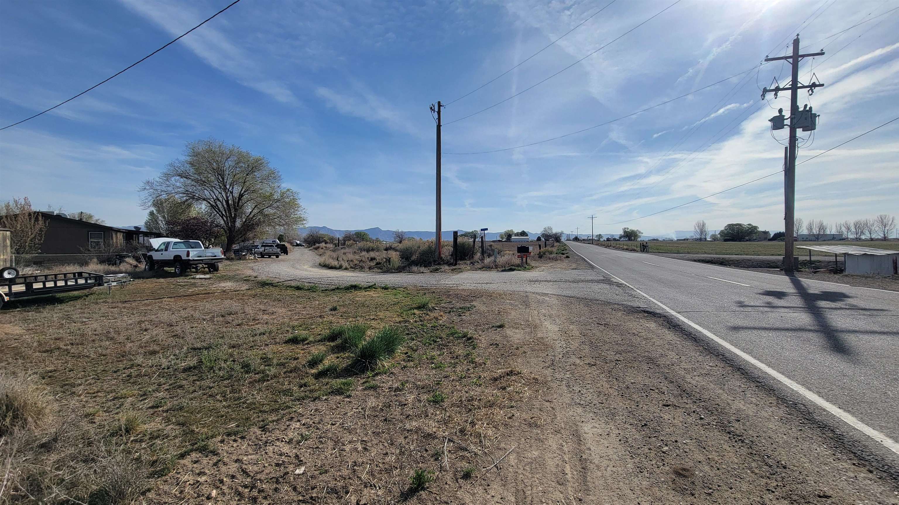 1844 M Road Fruita, CO 81521 - Photo 11 of 13 a view of a road with cars