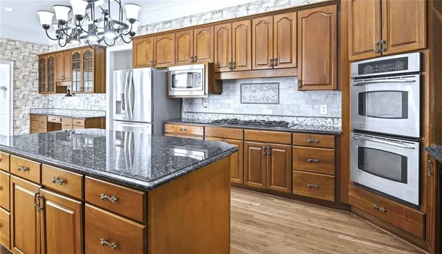 a view of a swimming pool with an outdoor space and seating area