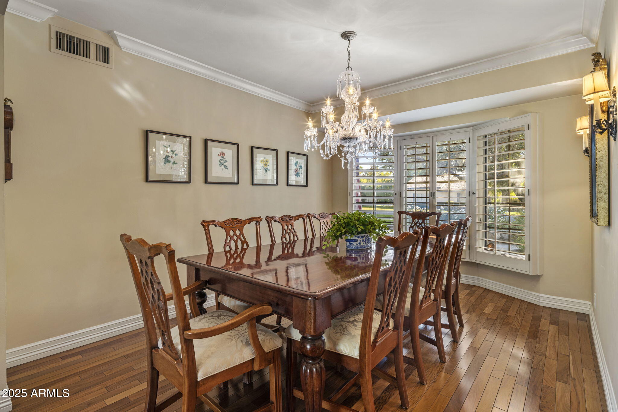 516 West Lawrence Road Phoenix, AZ 85013 - Photo 9 of 65 a view of a dining room with furniture window and wooden floor